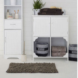 White storage cabinet with shelves and a mirror on a gray wall.