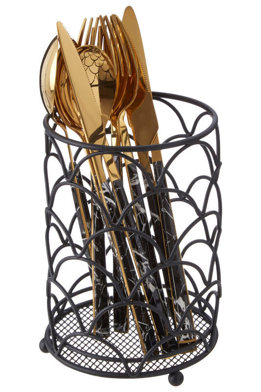 Black metal utensil holder with gold cutlery on a white background