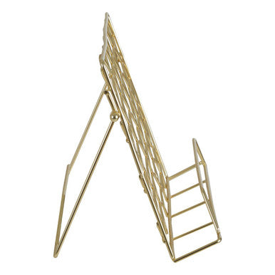 Gold metal magazine rack on a white background