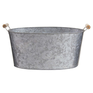 Metal basin with wooden handles on a white background