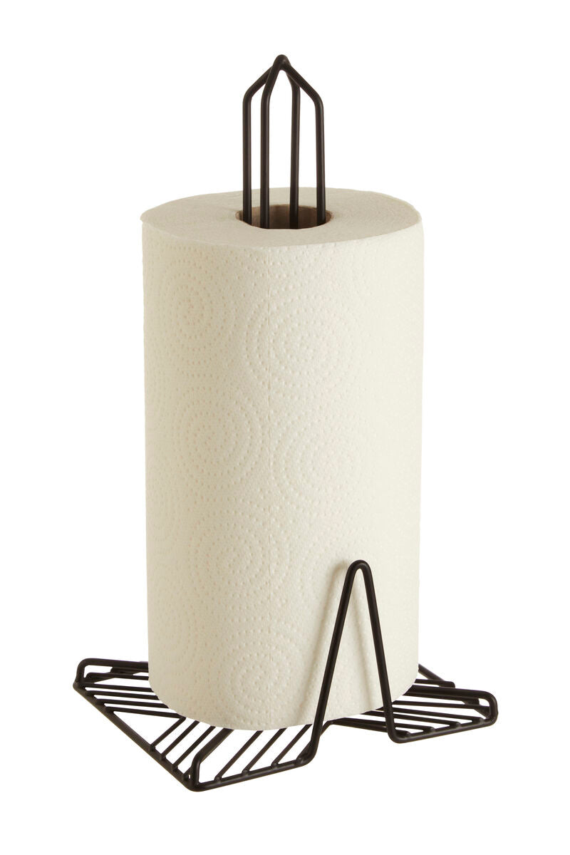 Paper towel roll on a black metal stand against a white background