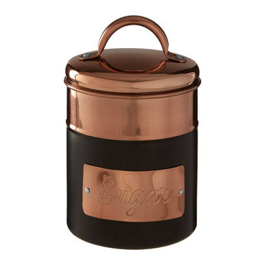 Copper and black sugar container on a white background