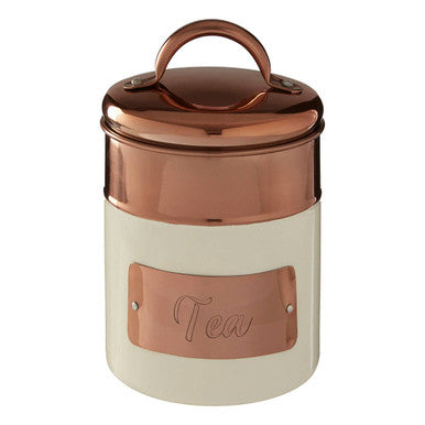 Cream-colored tea canister with a copper lid and label on a white background