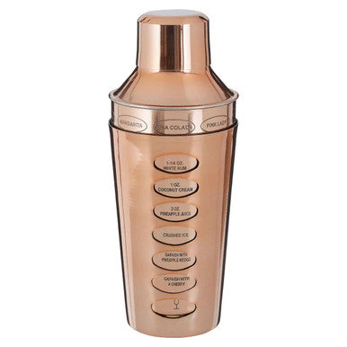 Rose gold cocktail shaker with measurement markings on a white background