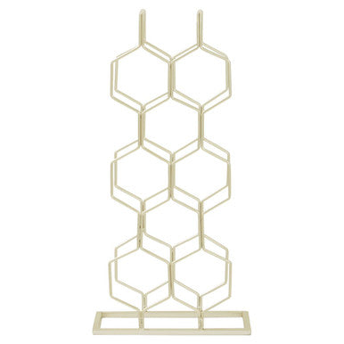 Gold honeycomb decorative stand on a white background