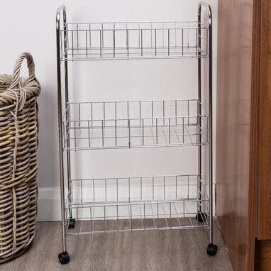 Wooden cabinet with a wire rack and wicker basket in a bathroom setting.