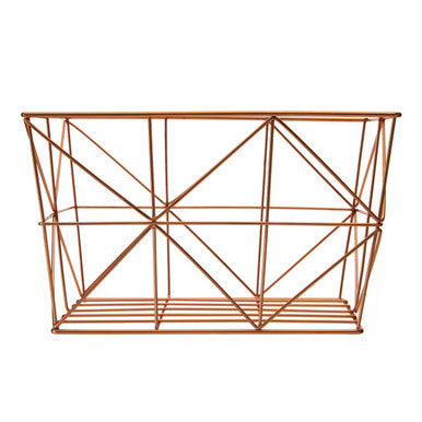 Copper wire basket with geometric design on a white background