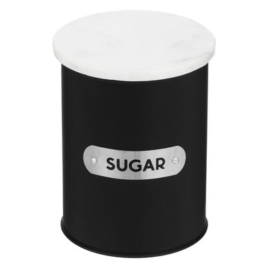Black sugar canister with a white lid on a white background