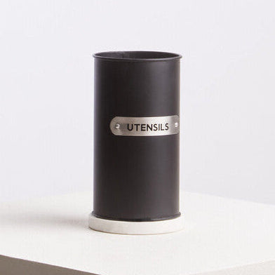Black cylindrical container with &