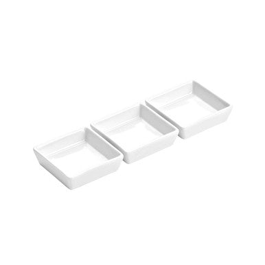 Three white rectangular trays on a white background