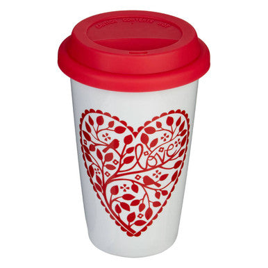 White travel mug with red heart design and lid on a white background
