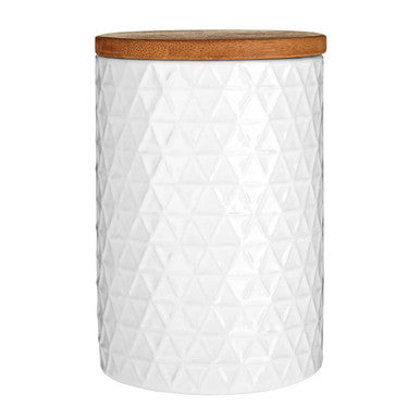 White textured storage jar with a wooden lid on a white background