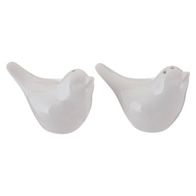 Two white ceramic birds on a white background