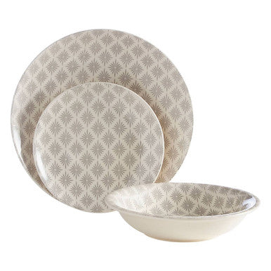 Set of ceramic plates with a geometric pattern on a white background