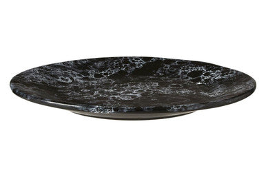 Black marble plate on a white background