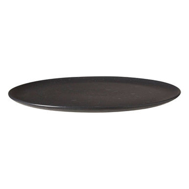 Black round plate on a white background