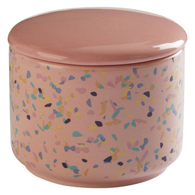 Pink container with colorful speckles on a white background