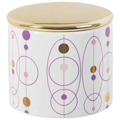 Decorative jar with a gold lid and circular pattern on a white background