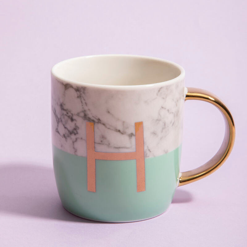 Mug with marble pattern and gold letter &