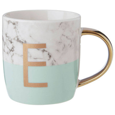 Marble-patterned mug with a gold handle and letter &