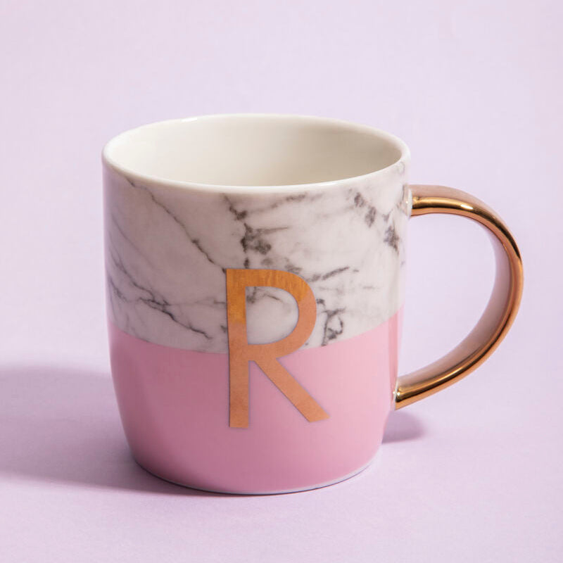 Marble-patterned mug with pink gradient and gold letter &