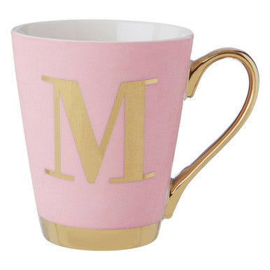 Pink mug with gold handle and letter &