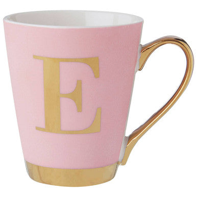 Pink mug with gold handle and letter &