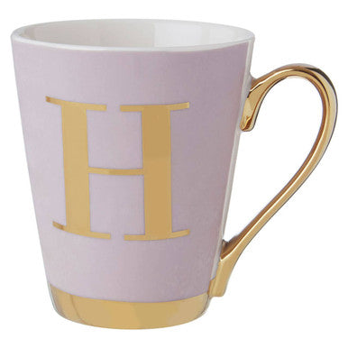 Mug with gold handle and letter &