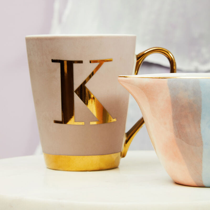 Beige mug with gold letter &