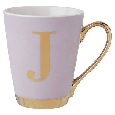 Pink mug with gold handle and letter &