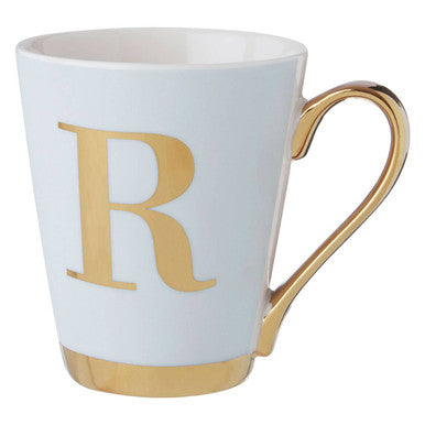 White mug with gold handle and letter &