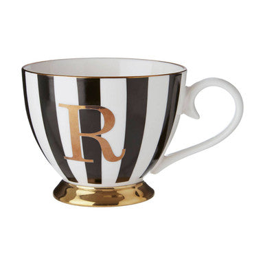 Black and white striped mug with gold letter &