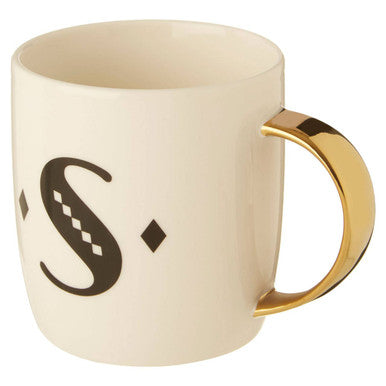 Beige mug with gold handle and decorative letter &