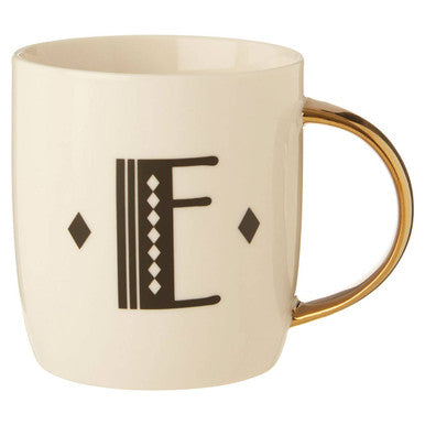 Beige mug with a brown letter &