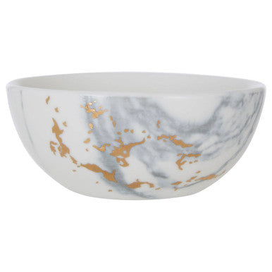 Marble-patterned bowl with gold accents on a white background