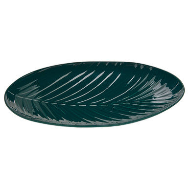 Green leaf-shaped plate on a white background