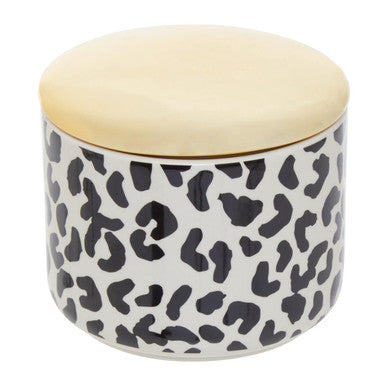 Jar with a leopard print pattern and beige lid on a white background