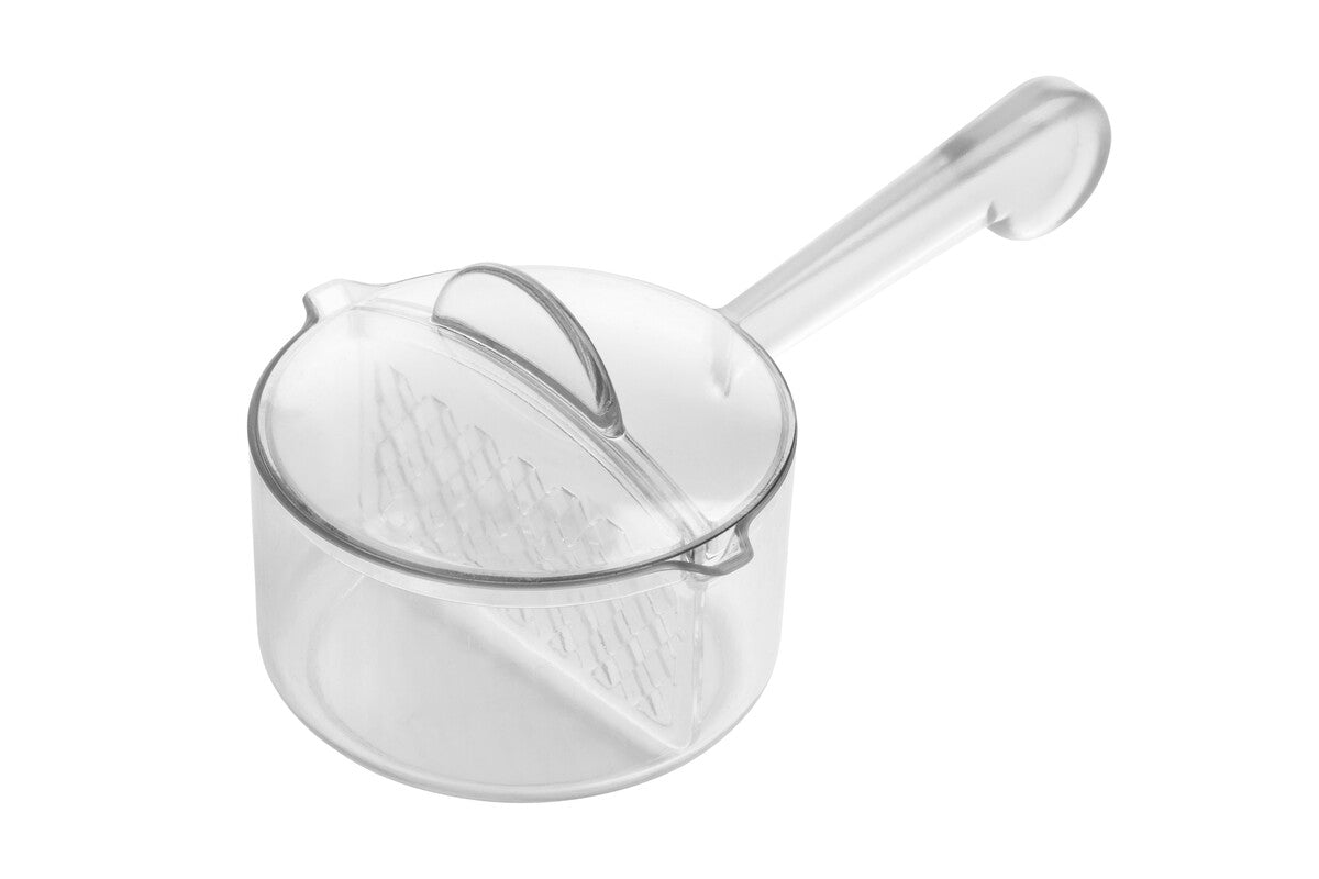 Clear glass measuring cup with handle on a white background