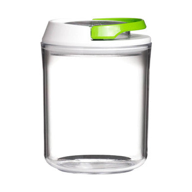 Clear glass container with a green lid on a white background