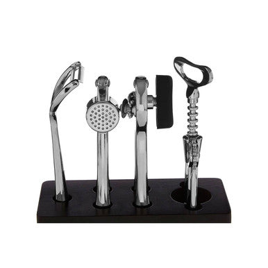 Set of bar tools including a ladle, muddler, and bottle opener on a black stand against a white background.