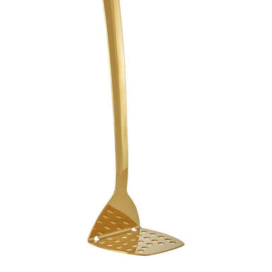Gold slotted spatula on a white background