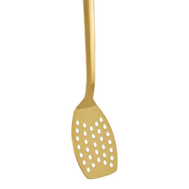 Gold slotted spoon on a white background
