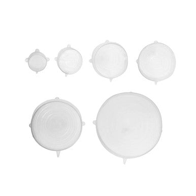 Set of white silicone lids on a white background