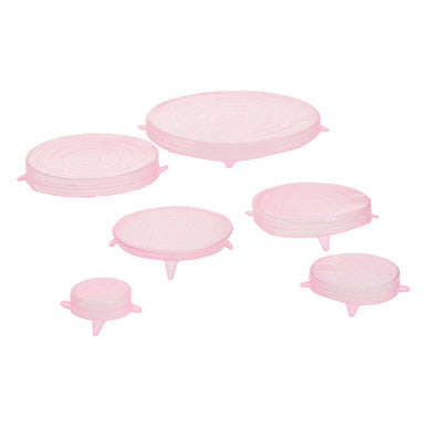 Set of pink silicone lids on a white background