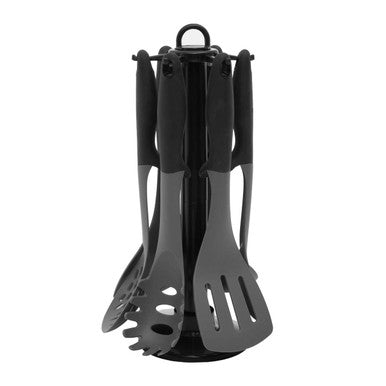 Black kitchen utensil set with holder on a white background