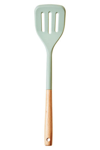 Spatula with green silicone head and wooden handle on a white background