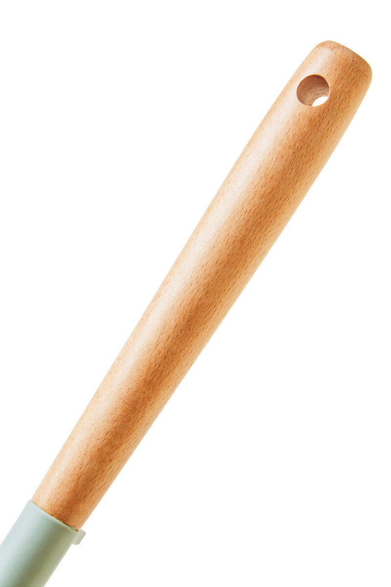 Wooden handle with a green base on a white background