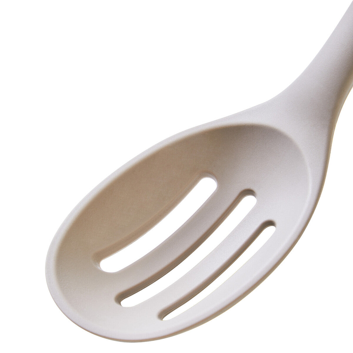 White slotted spoon on a white background