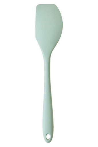 Mint green spatula on a white background