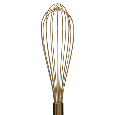 Metal whisk on a white background